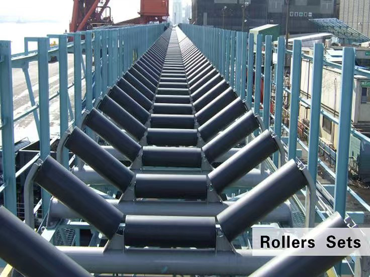 Apa fungsi idler ing conveyor sabuk?